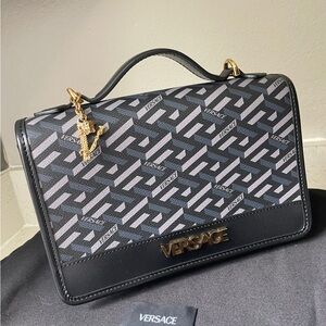 Versace Black patterned satchel with gold accents
